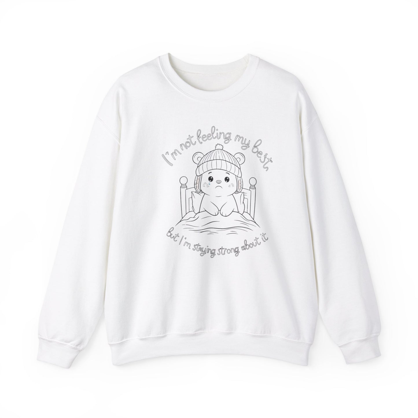 Adorable white sweatshirt with a line-art illustration of a bear in bed, with text 'I'm not feeling my best' and 'but I'm staying strong about it.'