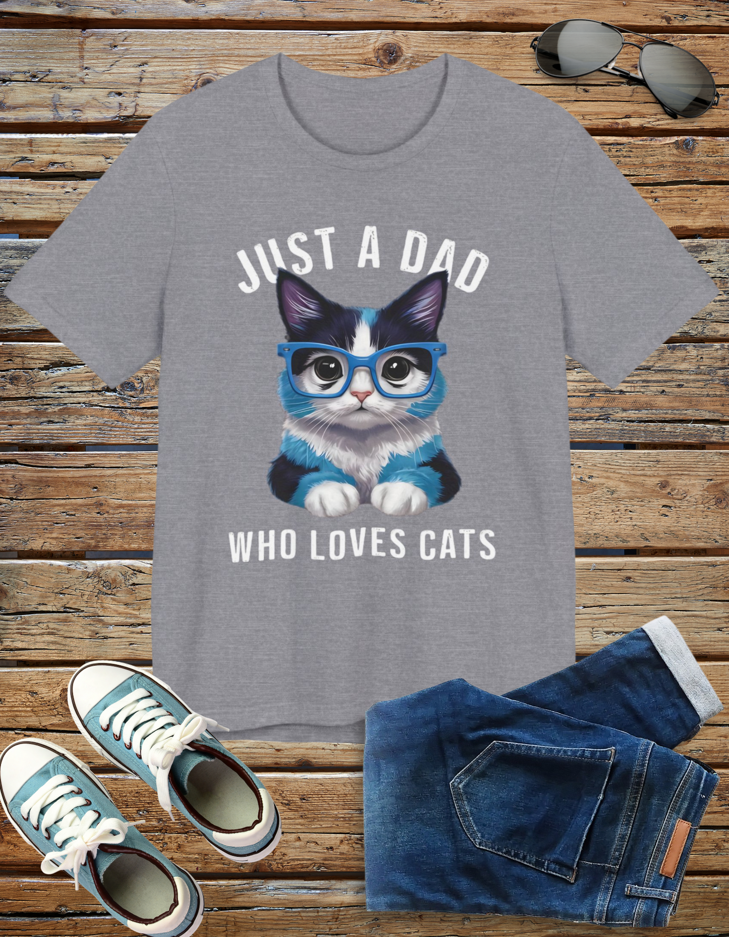 Just a Dad Who Loves Cats t-shirt featuring a cute cat graphic, perfect for dads who love cats.