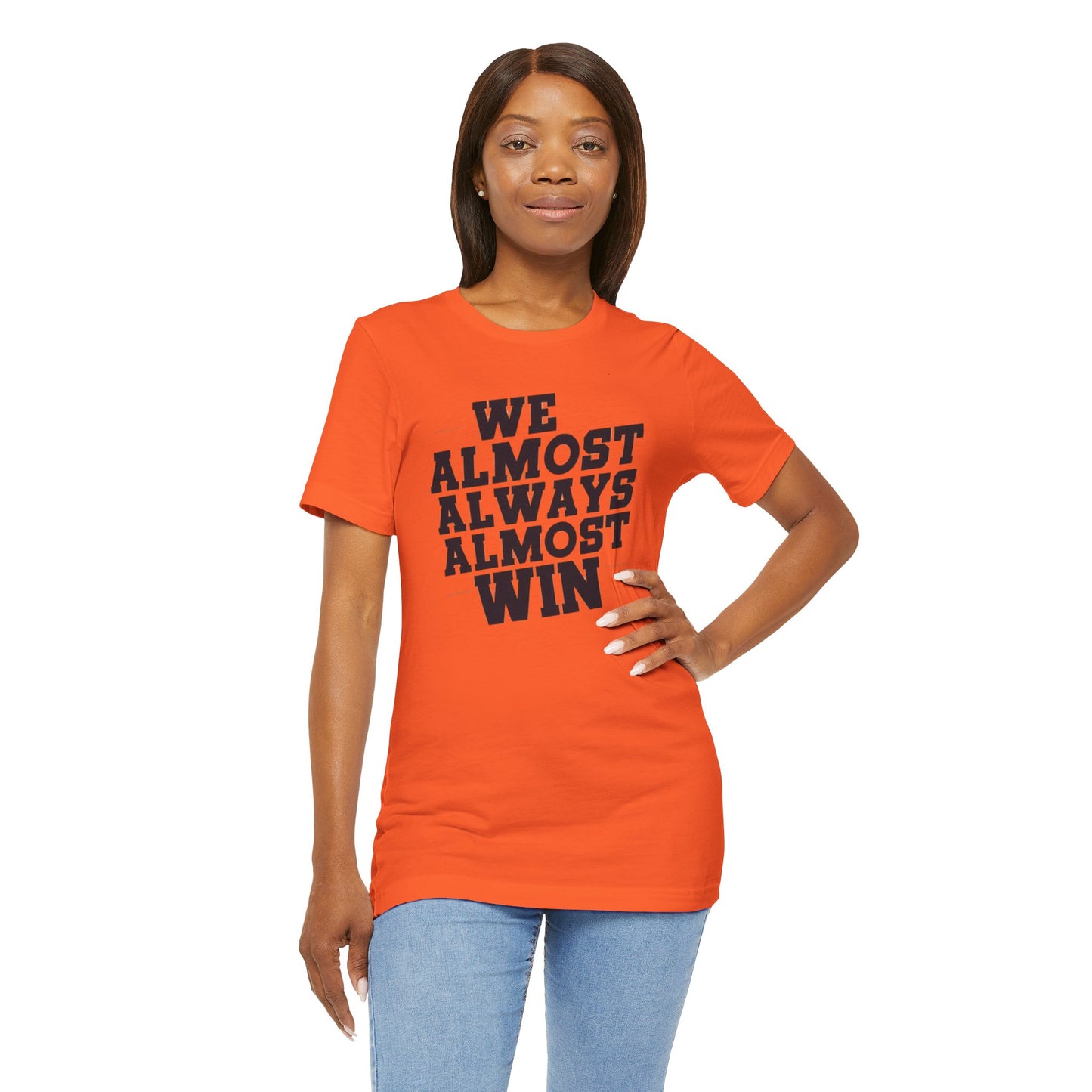 A stylish t-shirt with the motivational and humorous quote "We Almost Always Almost Win" printed in bold letters, perfect for sports enthusiasts and team players.