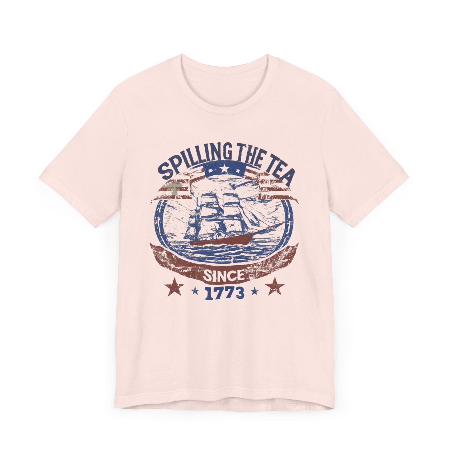 Various t-shirts featuring the text "Spilling the Tea Since 1773" with vintage-inspired graphics of ships and patriotic elements.