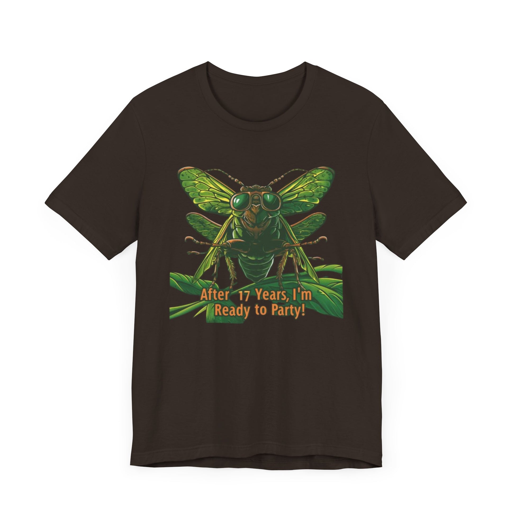 Unisex t-shirt featuring a cartoon cicada with sunglasses, captioned 'After 17 years I'm ready to party', designed for cicada lovers and bug enthusiasts.