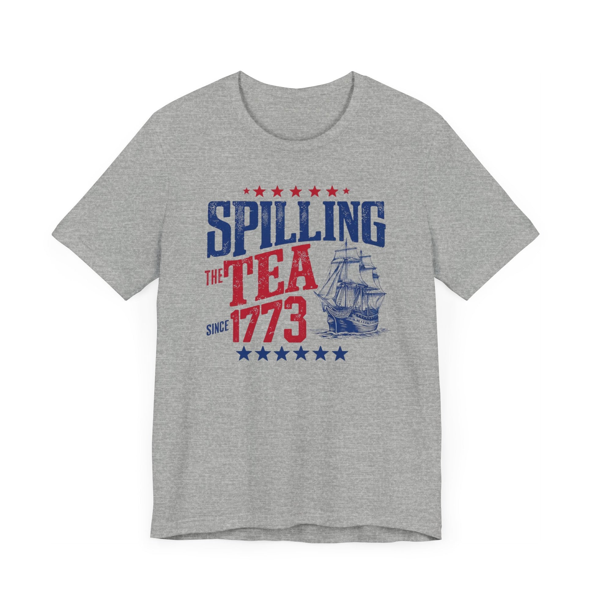 Various t-shirts featuring the text "Spilling the Tea Since 1773" with vintage-inspired graphics of ships and patriotic elements.