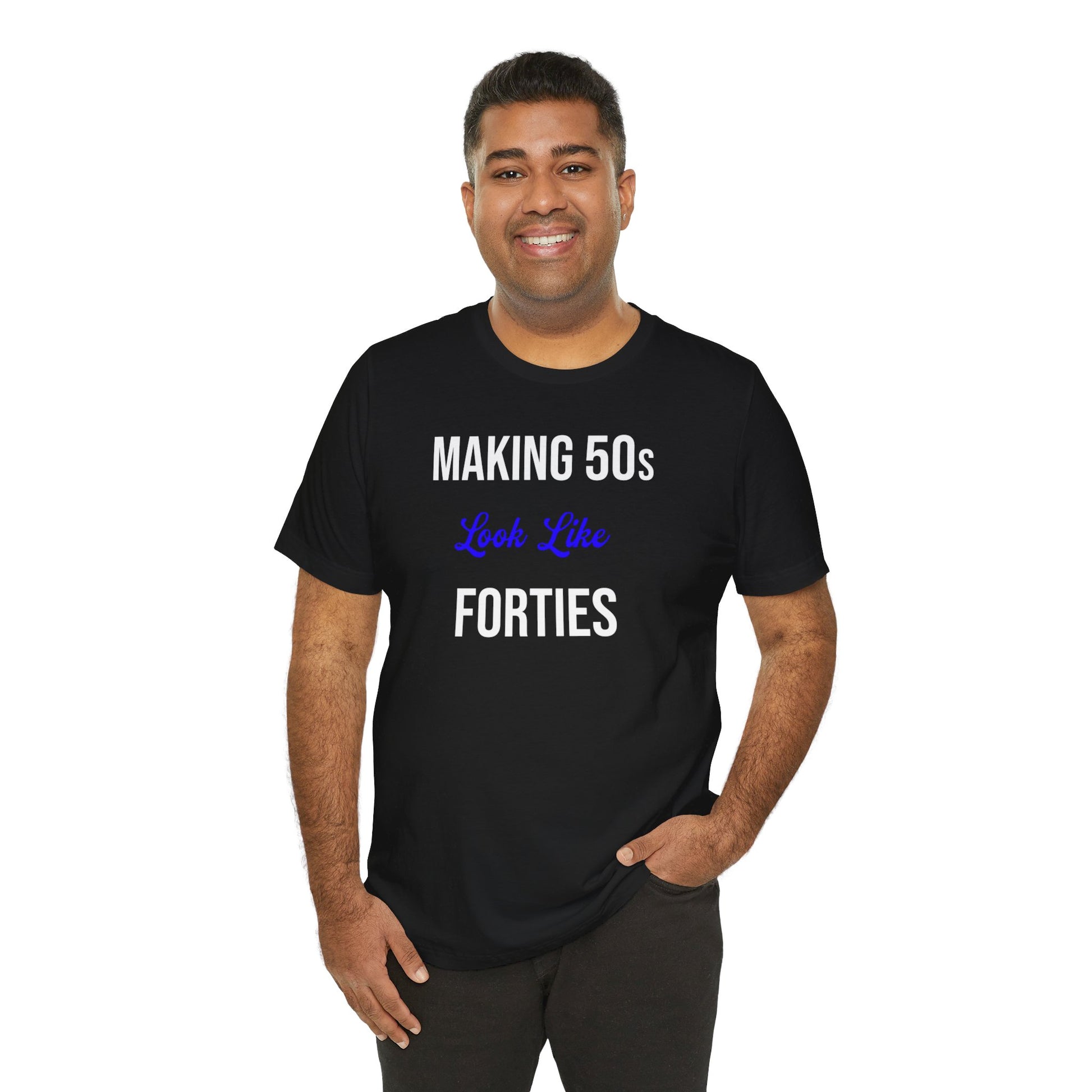 Black t-shirt with the text "Making 50s Look Like 40s" in bold letters, emphasizing a youthful spirit.