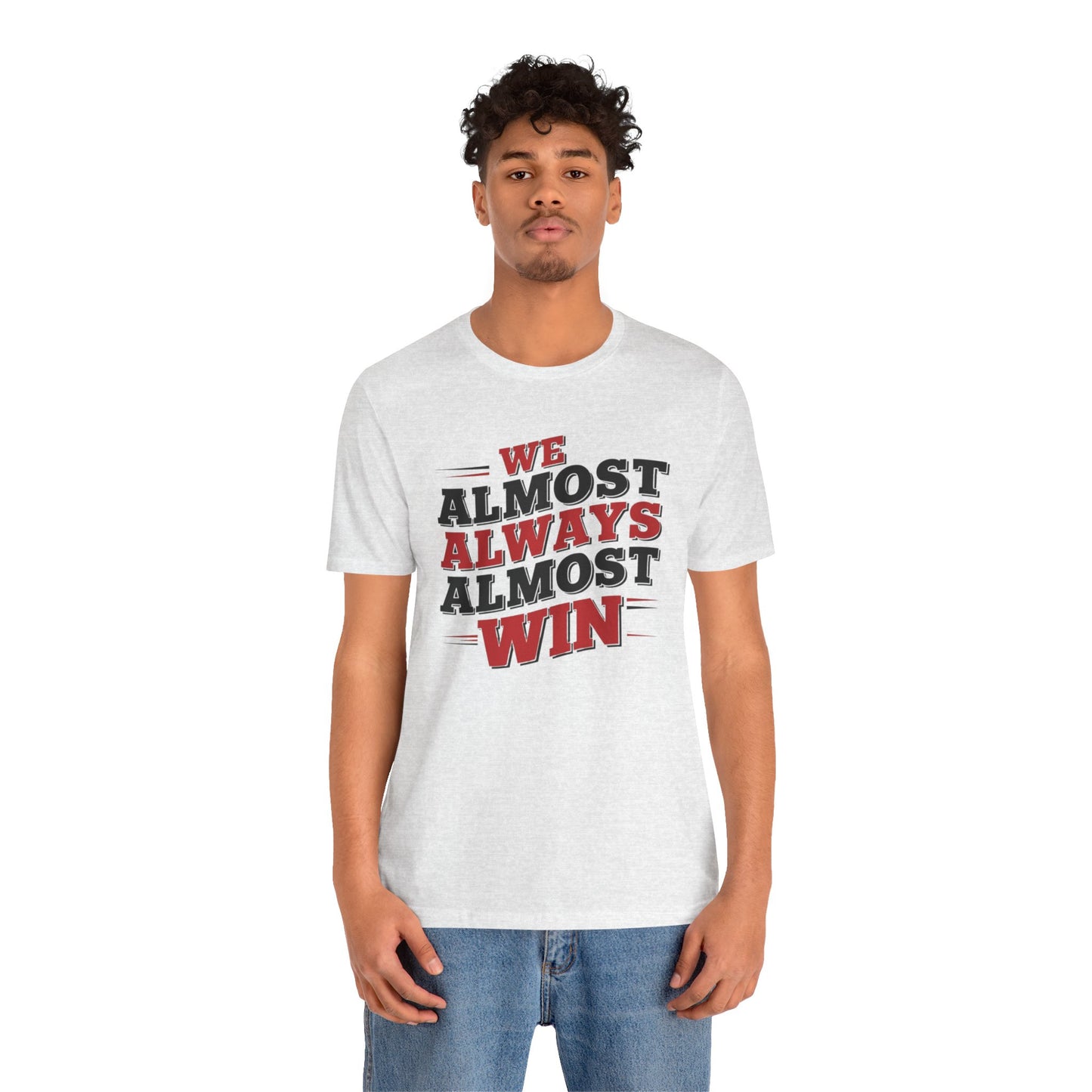 A stylish t-shirt with the motivational and humorous quote "We Almost Always Almost Win" printed in bold letters, perfect for sports enthusiasts and team players.