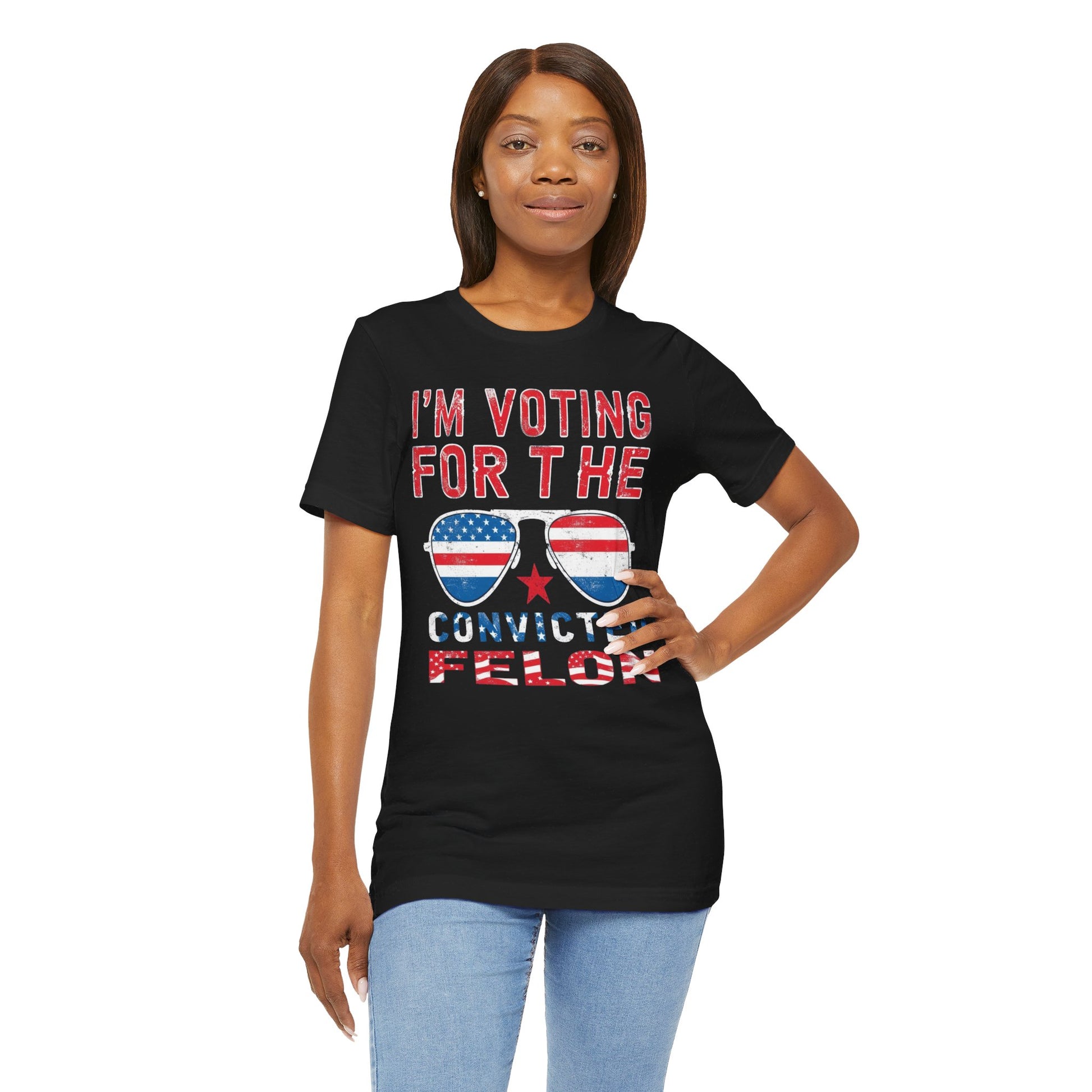 T-Shirts featuring the text "I'm Voting for the Convicted Felon" with patriotic American flag sunglasses design.