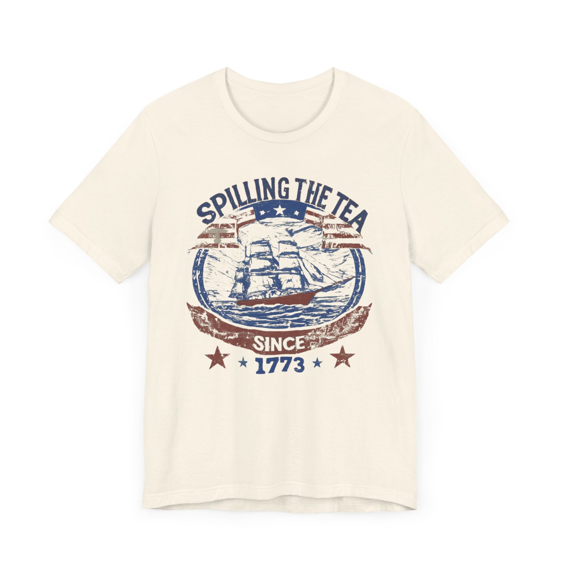 Various t-shirts featuring the text "Spilling the Tea Since 1773" with vintage-inspired graphics of ships and patriotic elements.