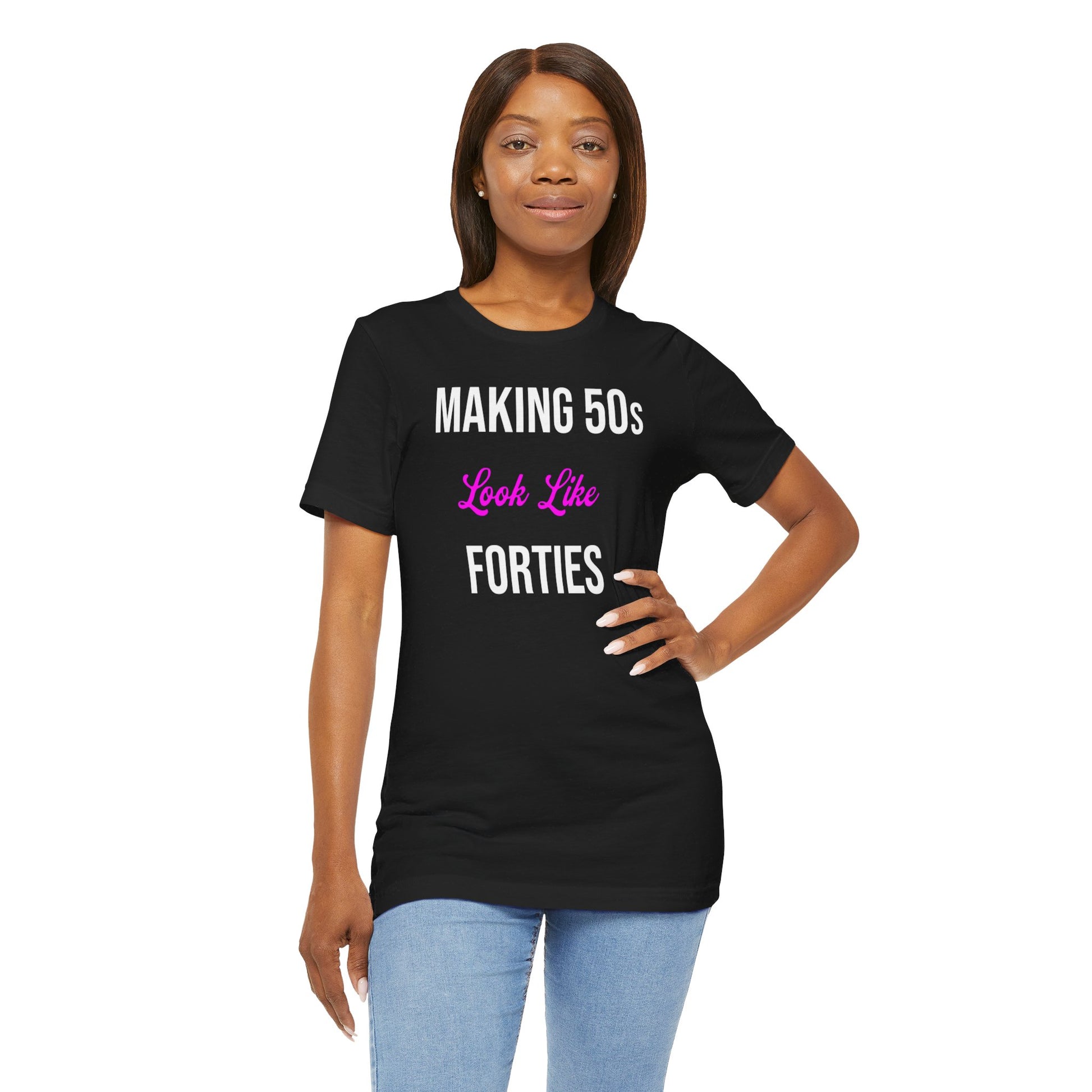 Black t-shirt with the text "Making 50s Look Like 40s" in bold letters, emphasizing a youthful spirit.