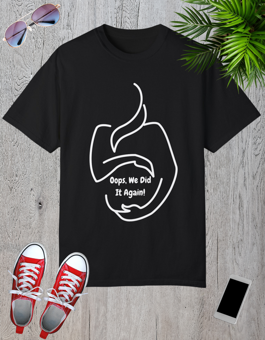 Black t-shirt with the text "Oops, We Did It Again!" featuring a humorous graphic of a pregnancy test.