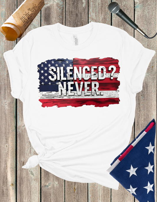 Silenced? Never. t-shirt with a distressed American flag background, featuring bold white text