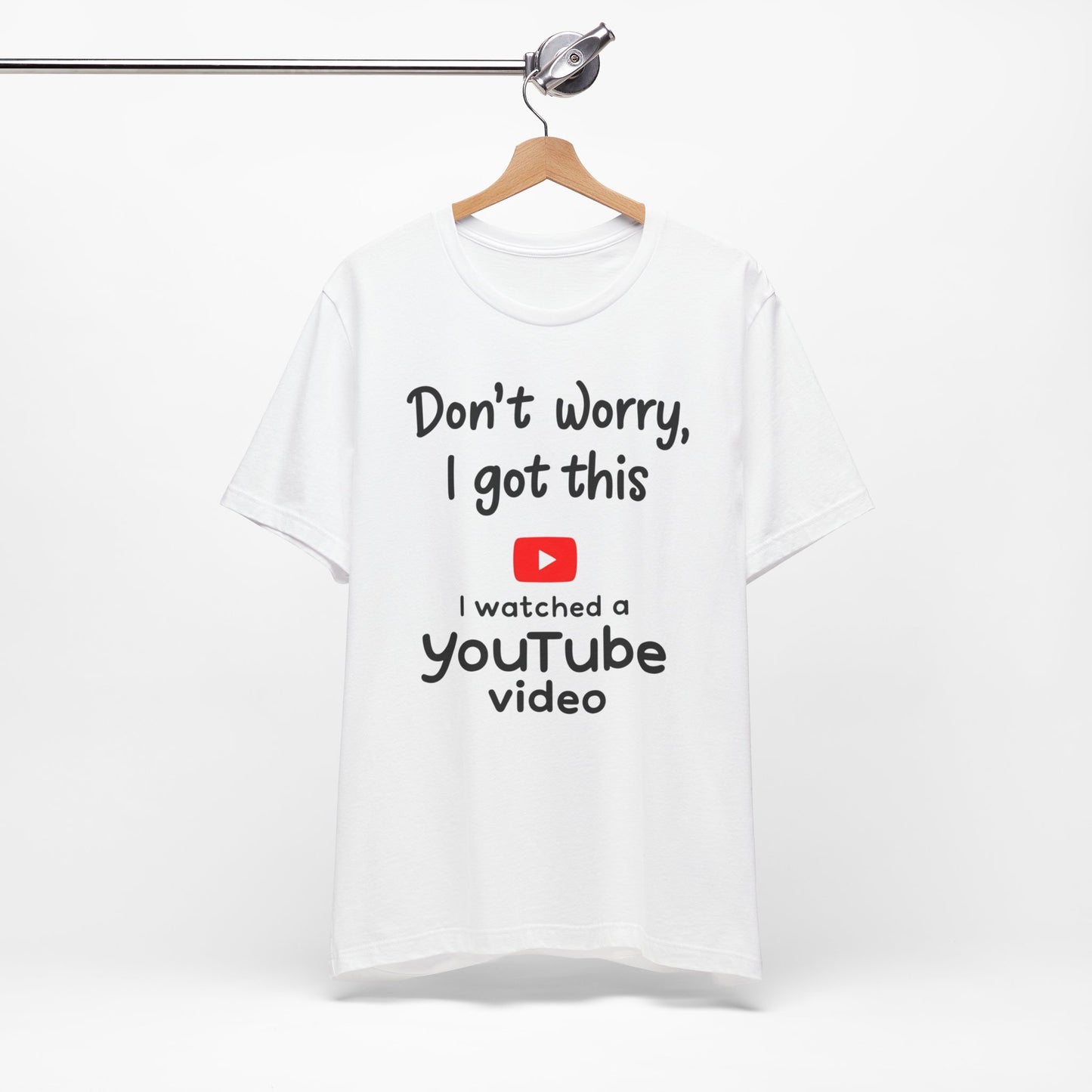 Black and white t-shirts featuring the text "Don't Worry, I Got This - I Watched a YouTube Video" with a playful YouTube logo graphic.