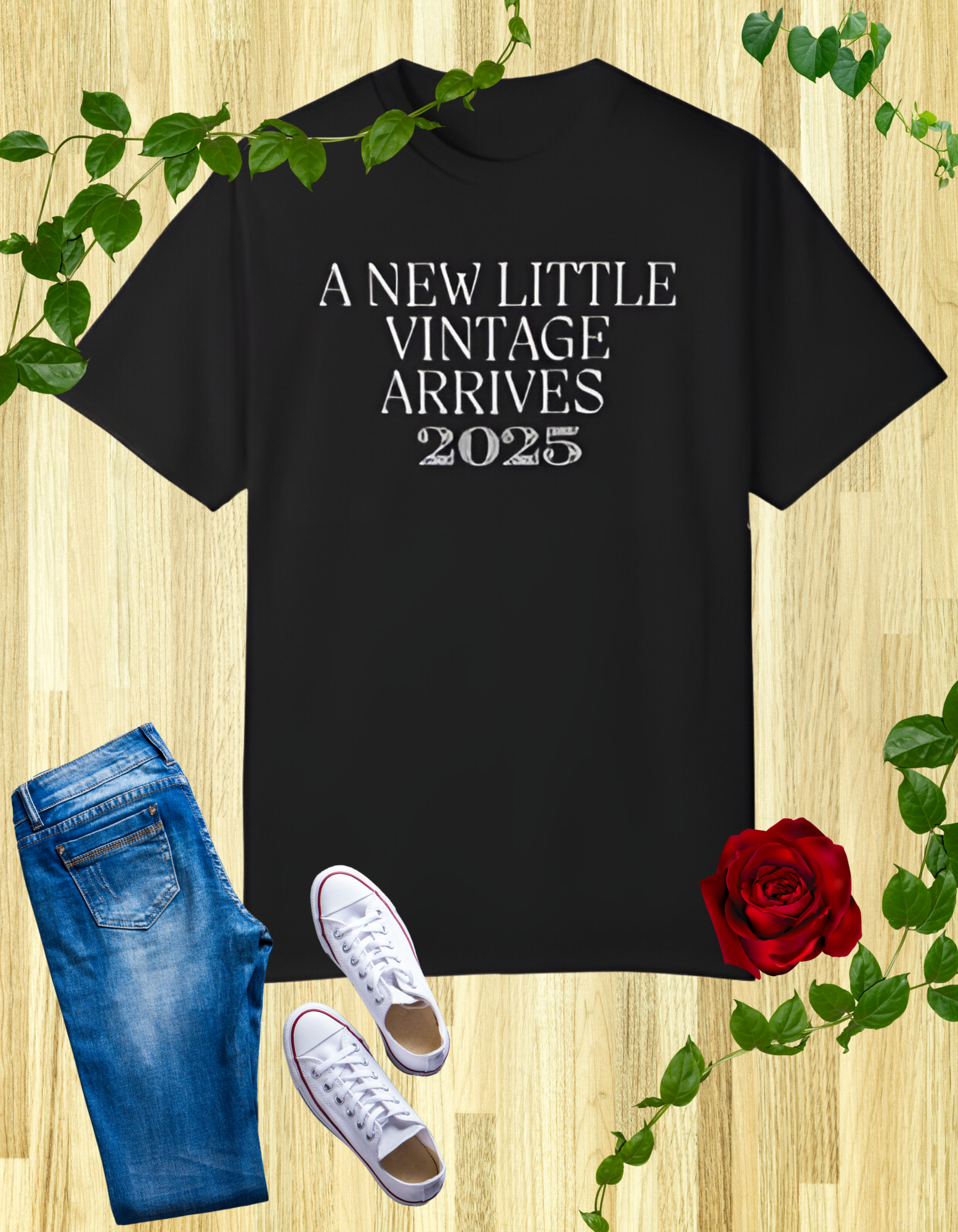 Black t-shirt with the text "A New Little Vintage Arrives 2024" in a classic, vintage-inspired font.