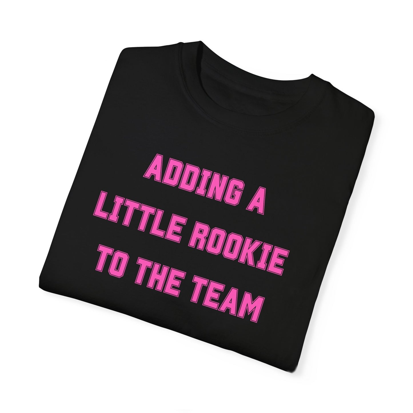 Black t-shirt with the text "Adding a Little Rookie to the Team" in a bold and playful font, available in blue, pink, and white.