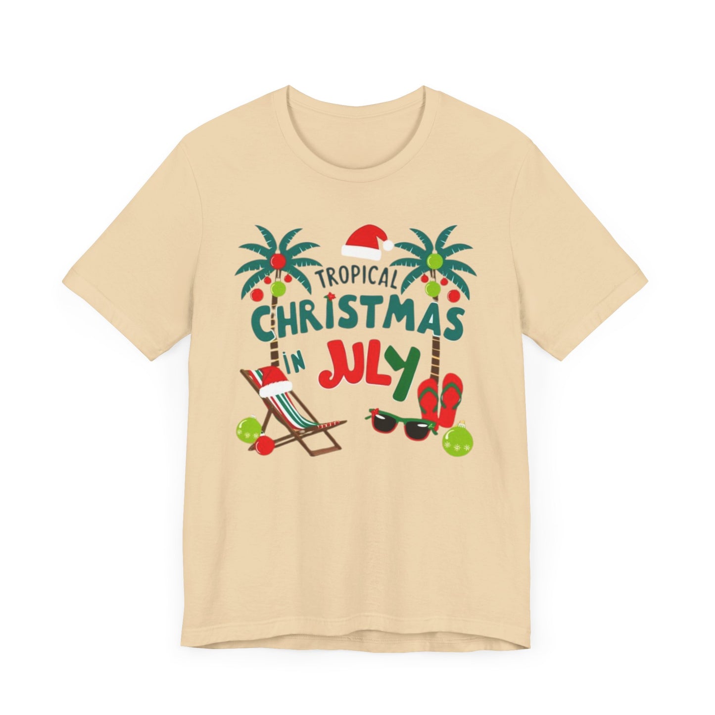 Tropical-themed t-shirts featuring the text "Christmas in July" with festive elements like palm trees, beach chairs, and a Santa.