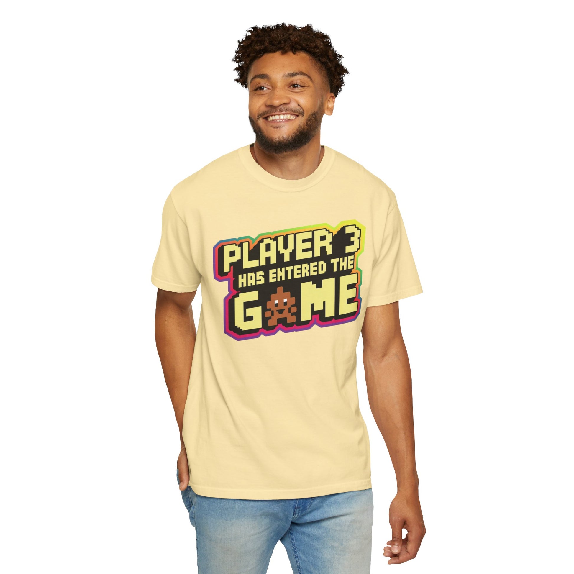 Multi-colored t-shirts featuring the text "Player 3 Has Entered the Game" in a retro gaming design.