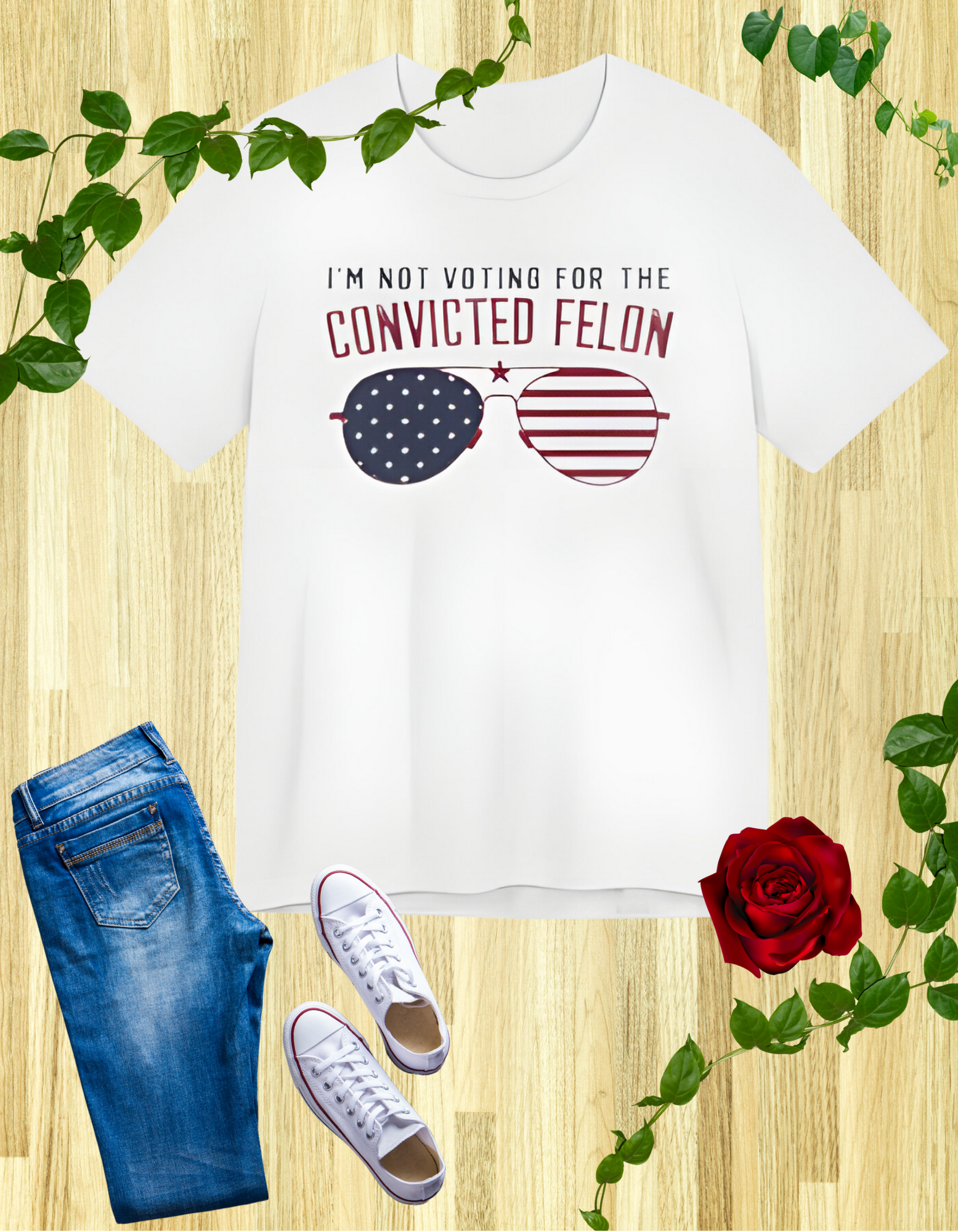 White t-shirts featuring the text "I'm Not Voting for the Convicted Felon" with a patriotic design of American flag sunglasses.