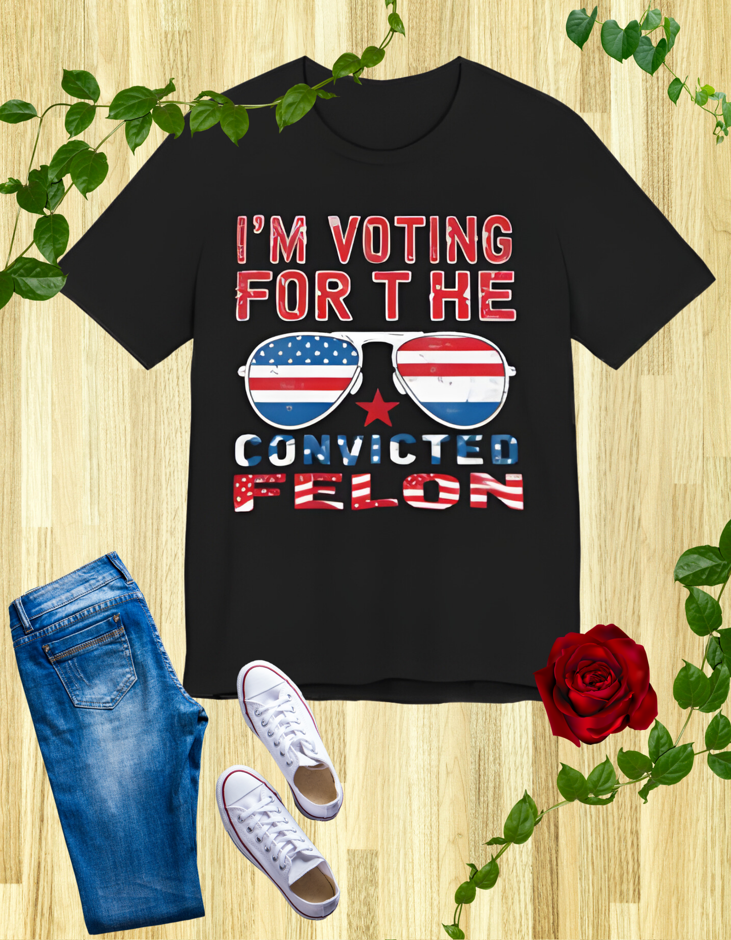 T-Shirts featuring the text "I'm Voting for the Convicted Felon" with patriotic American flag sunglasses design.