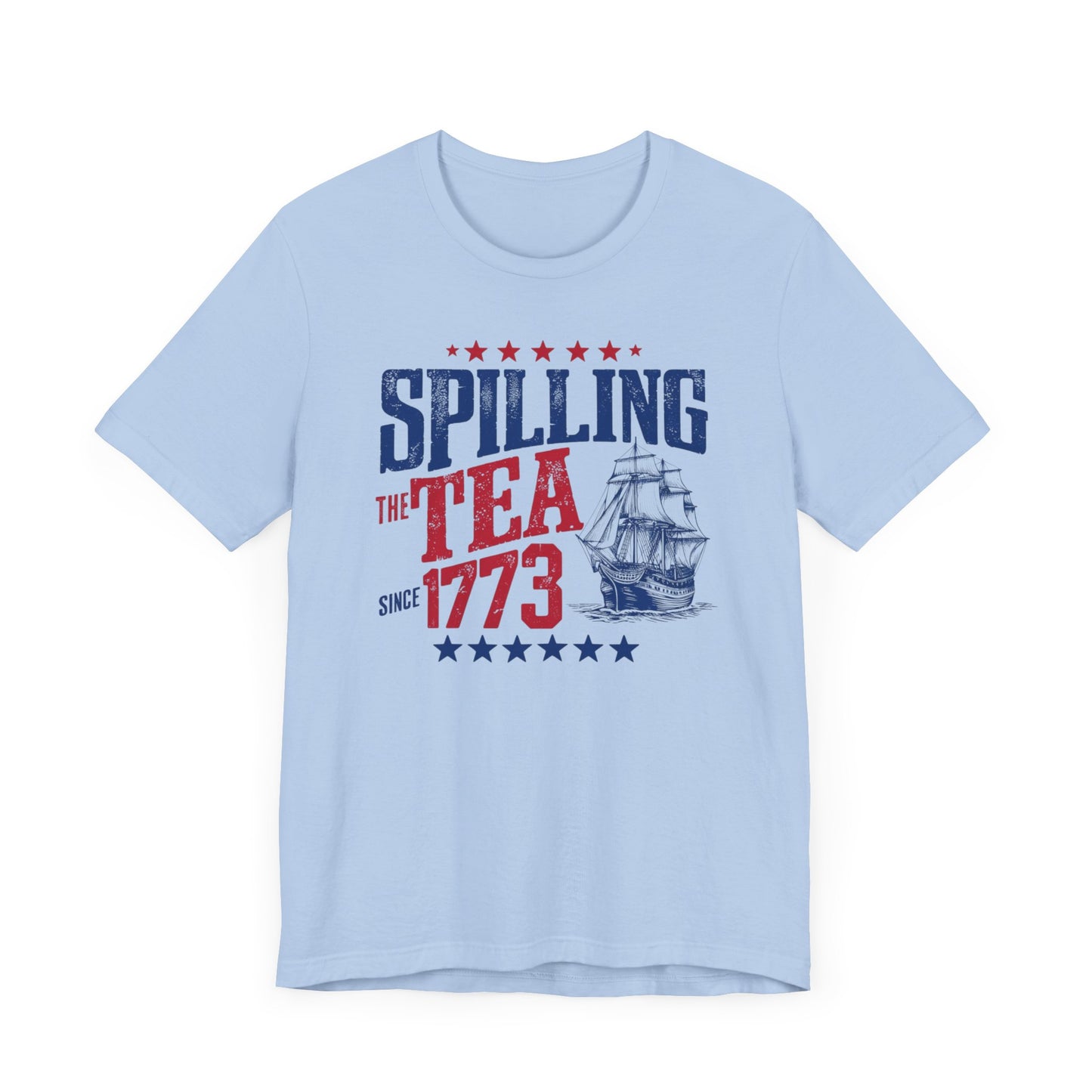 Various t-shirts featuring the text "Spilling the Tea Since 1773" with vintage-inspired graphics of ships and patriotic elements.