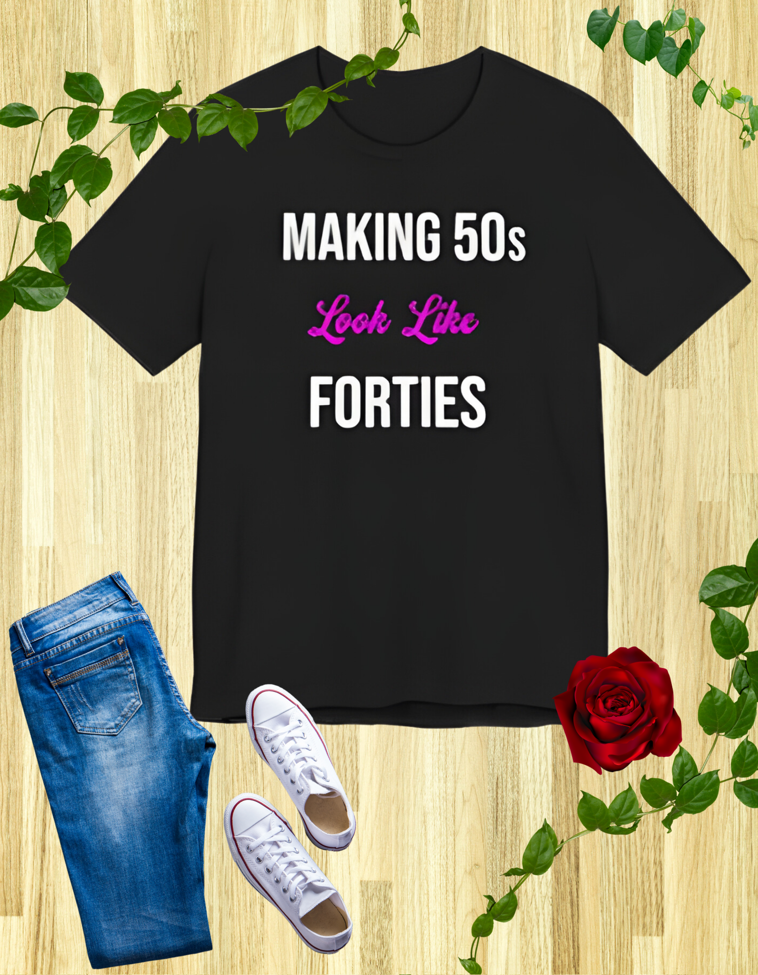 Black t-shirt with the text "Making 50s Look Like 40s" in bold letters, emphasizing a youthful spirit.