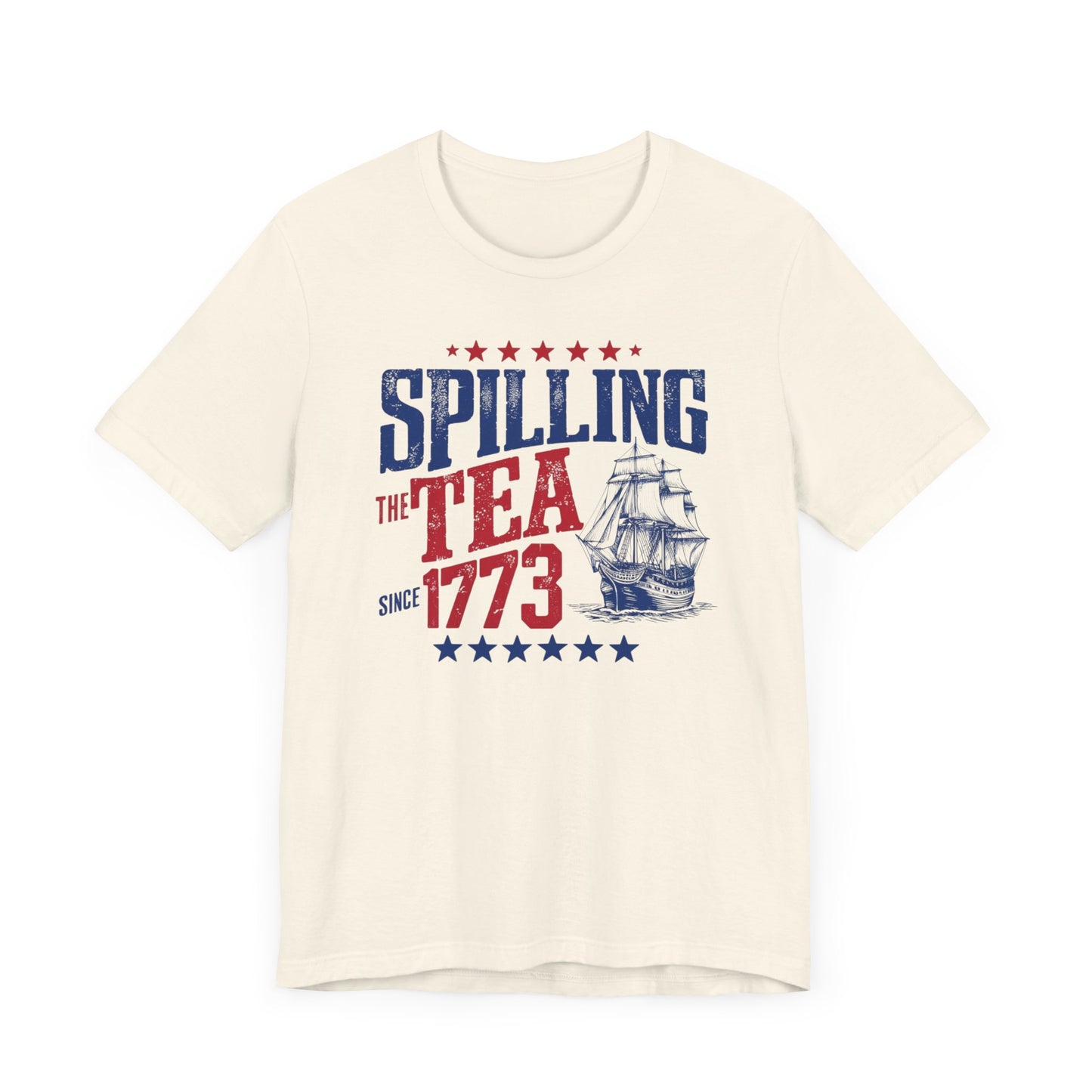 Various t-shirts featuring the text "Spilling the Tea Since 1773" with vintage-inspired graphics of ships and patriotic elements.