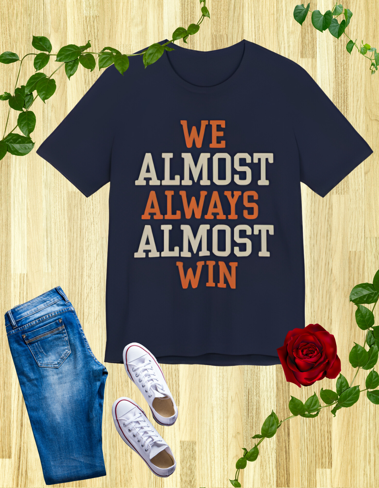 A stylish t-shirt with the motivational and humorous quote "We Almost Always Almost Win" printed in bold letters, perfect for sports enthusiasts and team players.