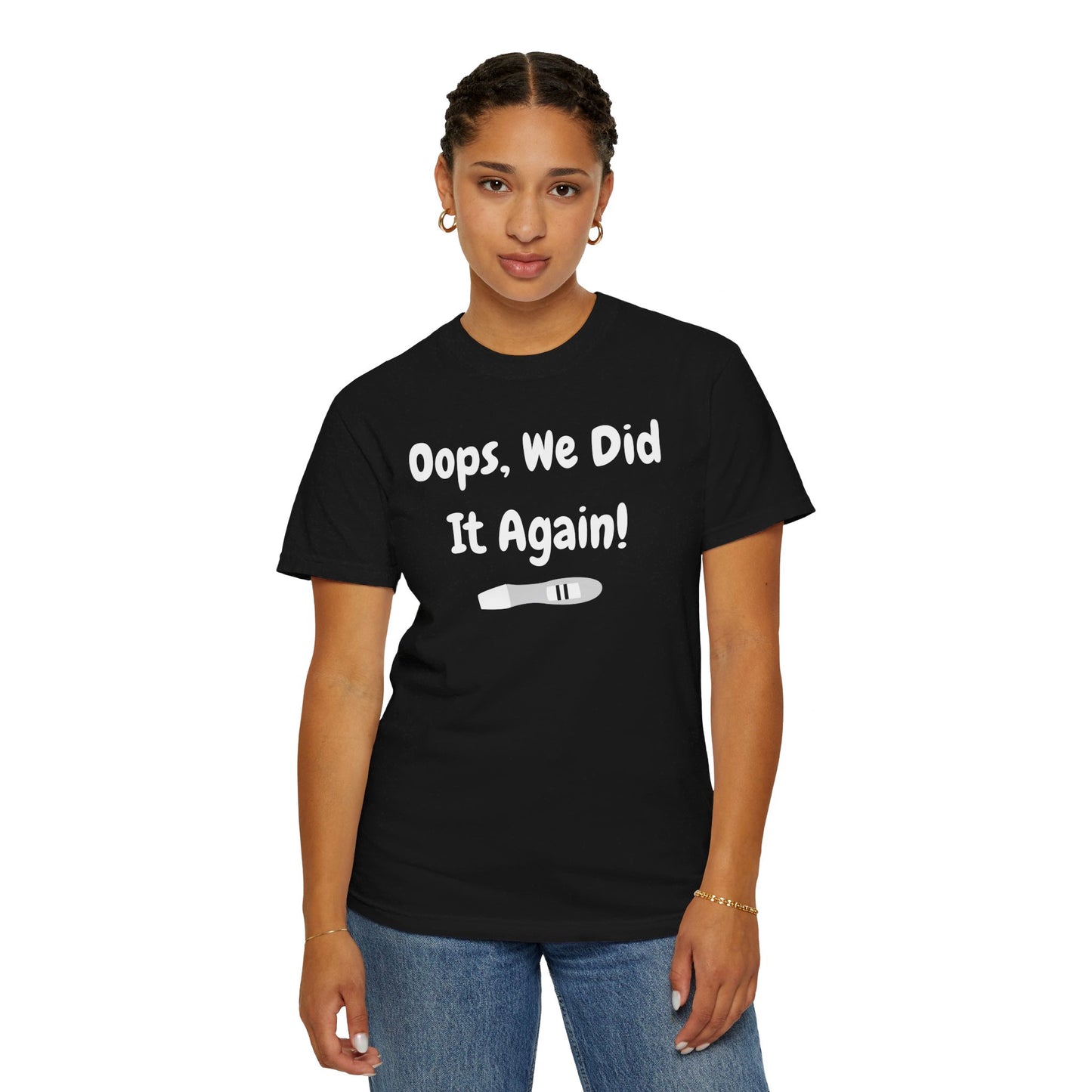 Black t-shirt with the text "Oops, We Did It Again!" featuring a humorous graphic of a pregnancy test.