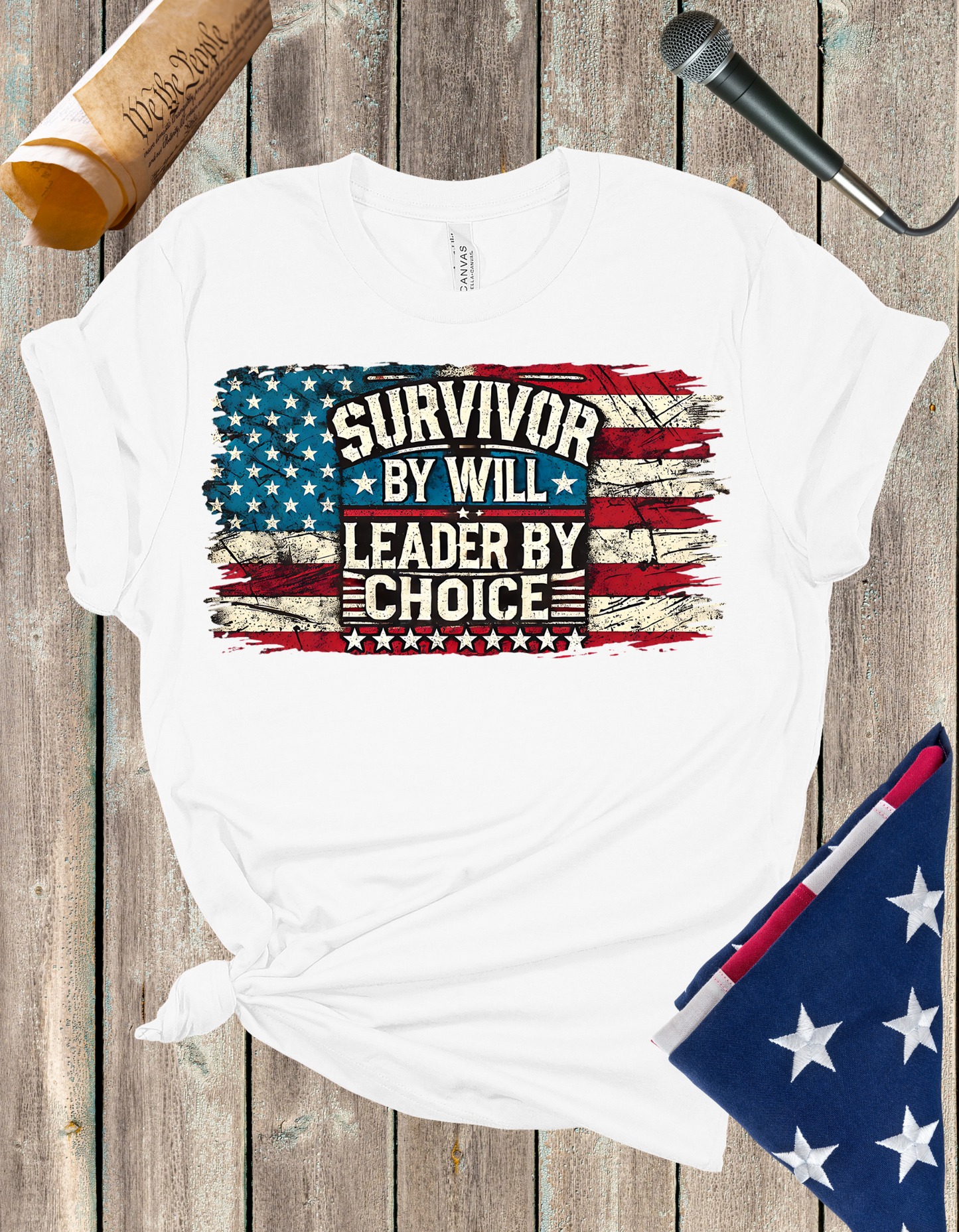 Silenced? Never. t-shirt with a distressed American flag background, featuring bold white text