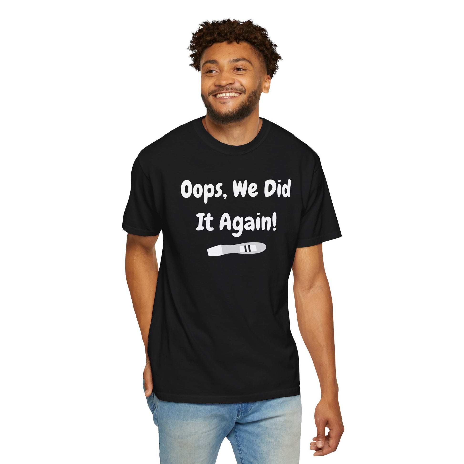 Black t-shirt with the text "Oops, We Did It Again!" featuring a humorous graphic of a pregnancy test.