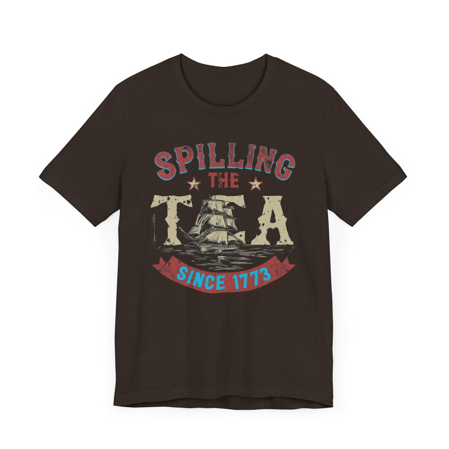 Various t-shirts featuring the text "Spilling the Tea Since 1773" with vintage-inspired graphics of ships and patriotic elements.