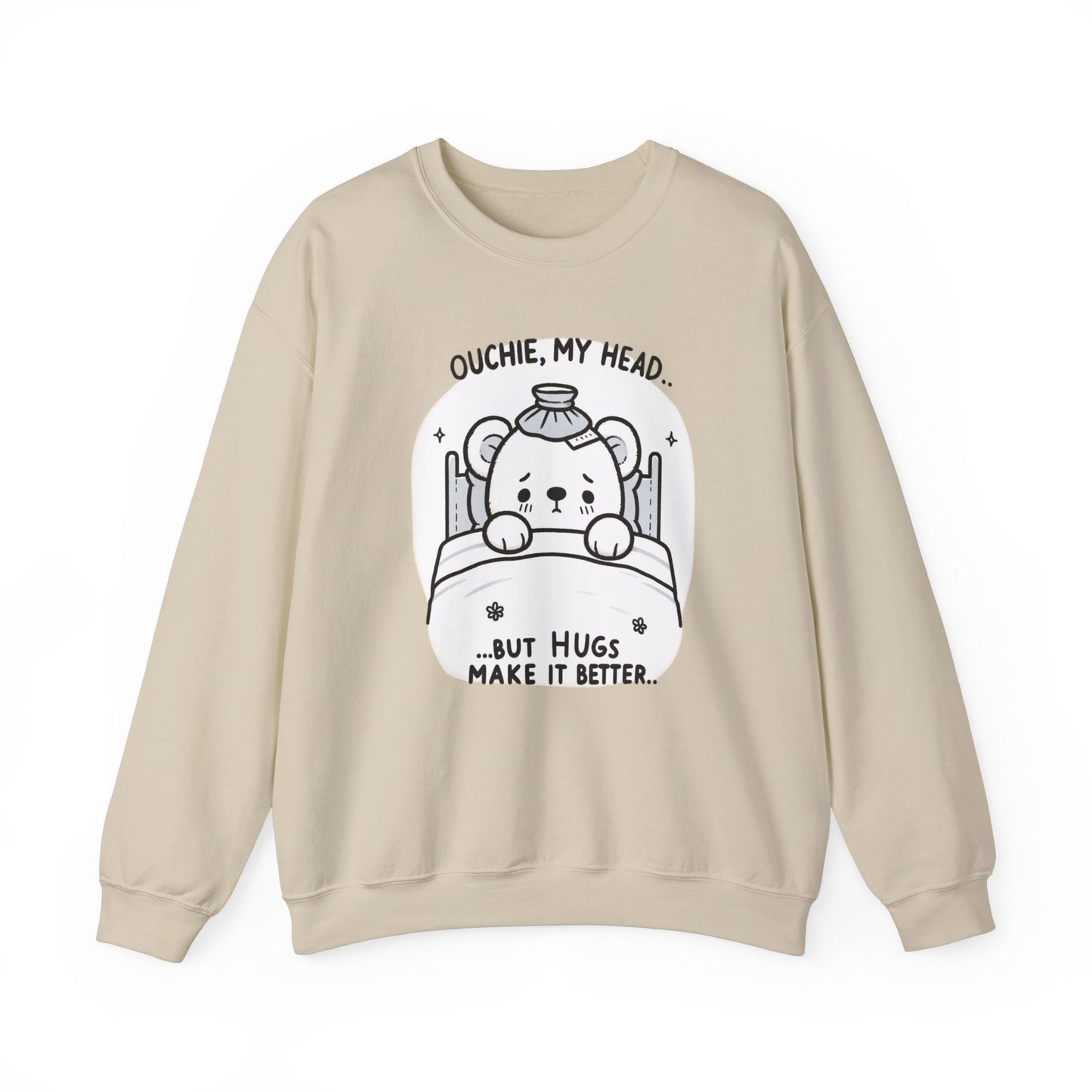 Cute sweatshirt featuring a line-art illustration of a bear with a sore head, text above 'Ouchie, My Head,' and below 'But Hugs Make It Better.'