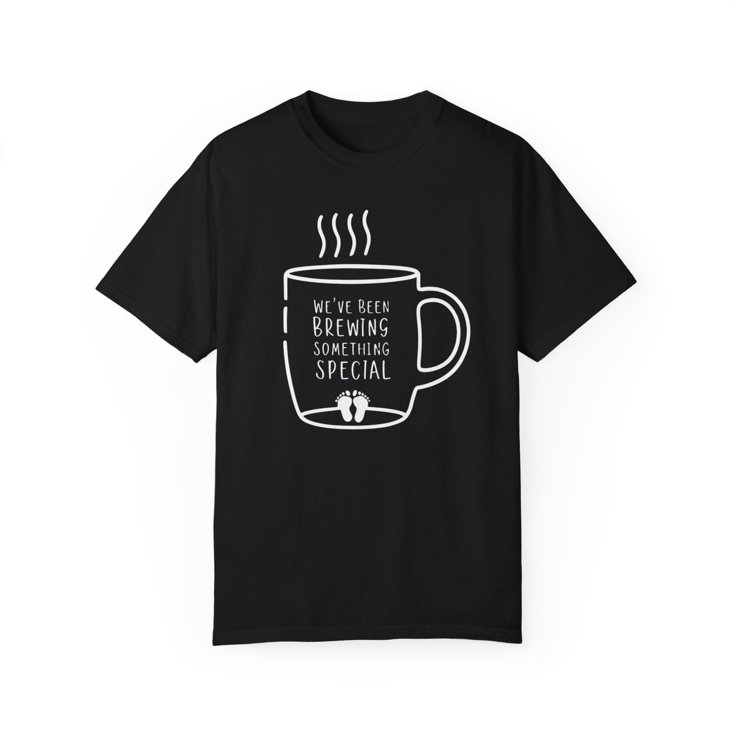 Black t-shirt featuring a coffee mug graphic with the text "We've Been Brewing Something Special" and tiny baby footprints.