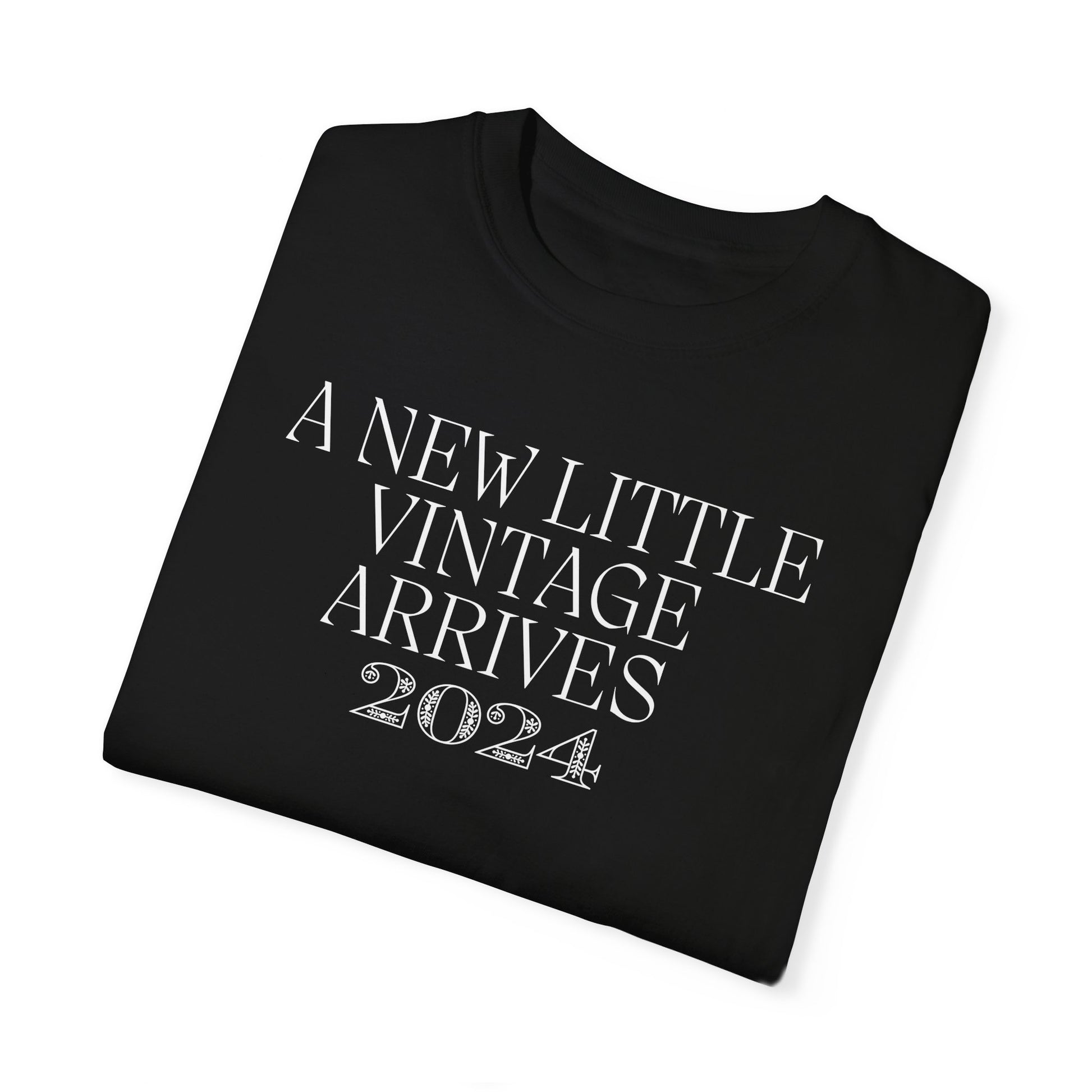 Black t-shirt with the text "A New Little Vintage Arrives 2024" in a classic, vintage-inspired font.