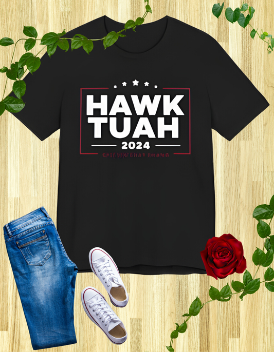 Black t-shirt with "HAWK TUAH 2024 I STAND WITH FREEDOM" in bold letters.