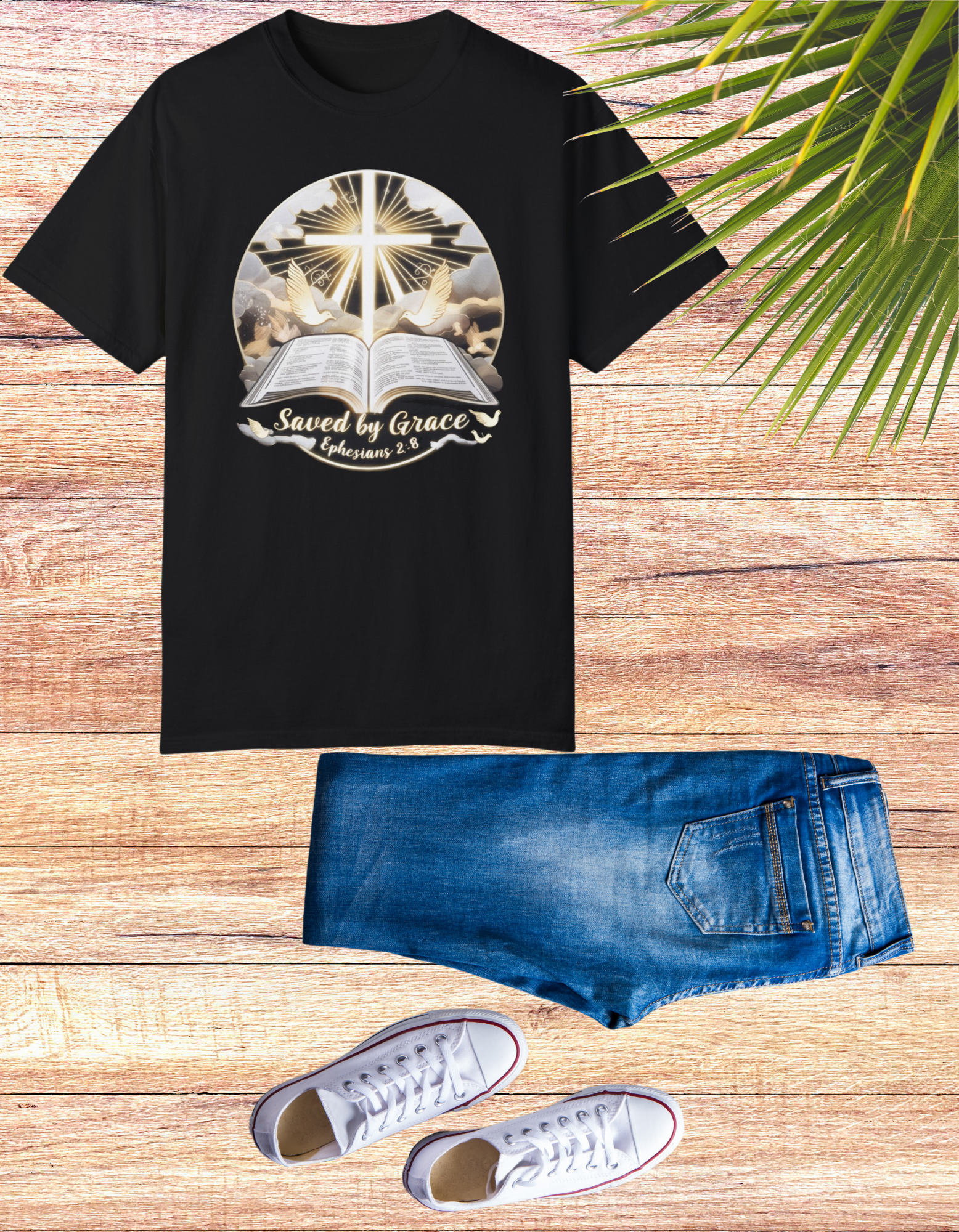 Divine "Saved by Grace" Christian graphic tee featuring a radiant cross emerging from the clouds and an open Bible with Ephesians 2:8, perfect for expressing faith and spirituality.