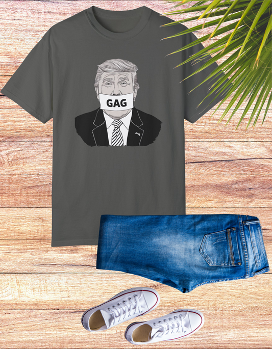 Controversial "Gag" Trump political t-shirt featuring an illustration of Donald Trump with the word "GAG" across his mouth, perfect for making a bold and provocative statement.