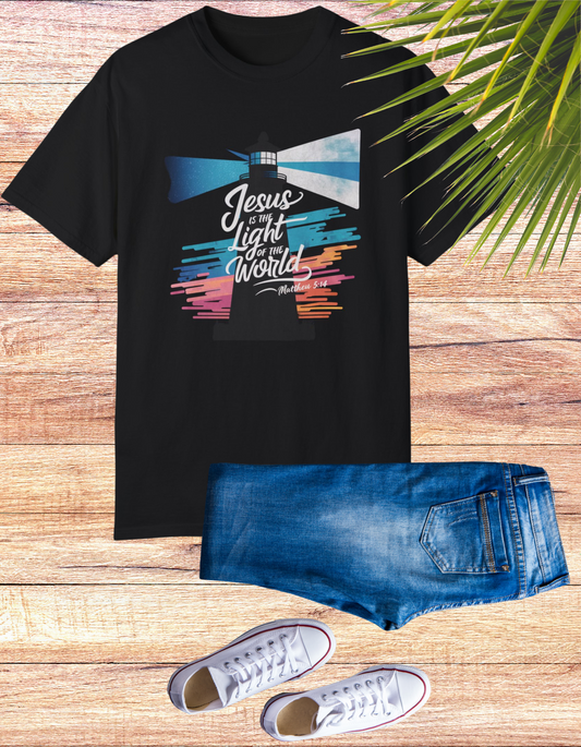 Inspirational "Jesus is the Light of the World" Christian graphic tee featuring a vibrant lighthouse design with colorful beams and a message from Matthew 5:14, perfect for expressing faith and spirituality with a vintage touch.